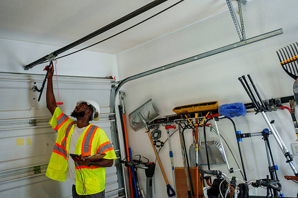Professional Garage Door Panel Replacement technician working in Robertsville, NJ